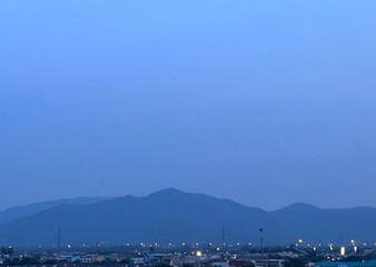 Naklejka premium The city and the mountain blue color in Thailand