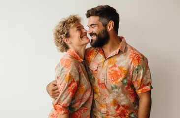 Joyful Togetherness: Couple Laughing in Colorful Embrace