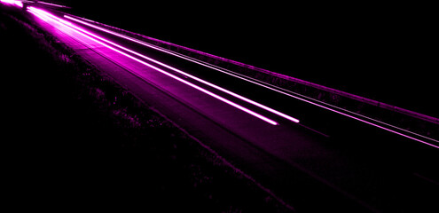 violet car lights at night. long exposure