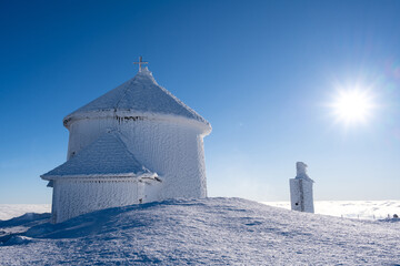 summit of Sniezka mountain in Giant mountains during winter in sunny day - 762513481