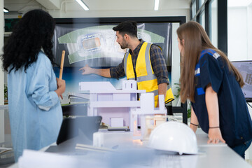 Obraz premium Engineers, architects, and designers collaborate to design a building that employs natural energy.