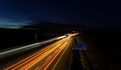 Fototapeta na wymiar Licht auf der Autobahn A7 Deuchland