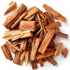 Pile of sandalwood chips isolated on white background. From above.