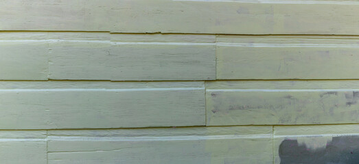 Panorama background of green painted weathered wood, wide creative copy space, horizontal aspect