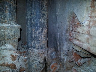 Old damaged water pipes at interior apartment building