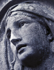 Close-up of the face of the Virgin Mary after the suffering of Jesus Christ