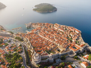 Aerial establishing shot of old town of Dubrovnik, Dalmatia, Croatia. Medieval city fortress on the coast of Adriatic sea. Drone view. Travel destination - 762563650