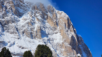 Cliff wall and close up structure of Dolomites rocks
