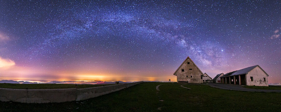 Milky Way over the abandoned buildings at the top of Picon Blanco, in Espinosa de los Monteros, Burgos, a cloudless night with a starry sky