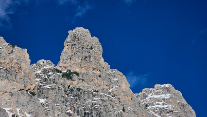 Cliff wall and close up structure of Dolomites rocks