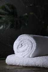 White terry towels on table in bathroom