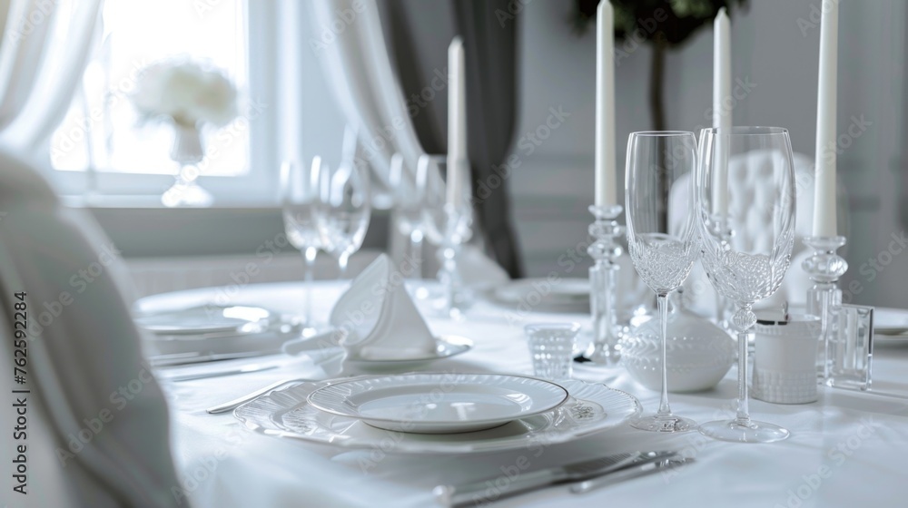 Poster table with white tablecloth and white napkin. there are several wine glasses and wine bottles on tab