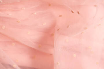 Tulle fabric texture background, textile pattern, pink polka dot on tulle, copy space