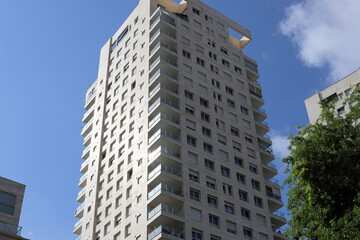 Fototapeta premium Modern appearance of high-rise buildings and structures made of glass and concrete.