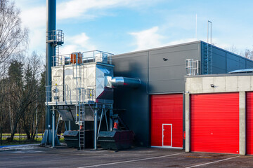New modern wood chip biofuel boiler house for increased heat energy production efficiency in action