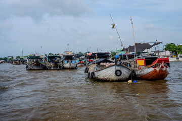Traditional Boats at Bustling Mekong Delta Floating Market, Vietnam