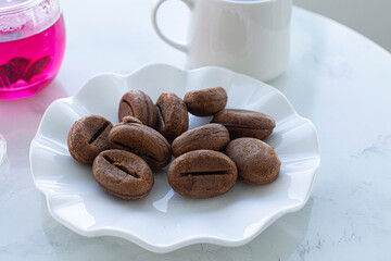 Coffee bean cookies on a white background.