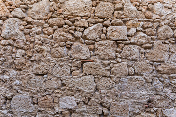 Close up stone wall of medieval monumental and historical area of Greece city in Rhodes