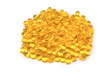 A group of yellow capsules isolated on a white background.