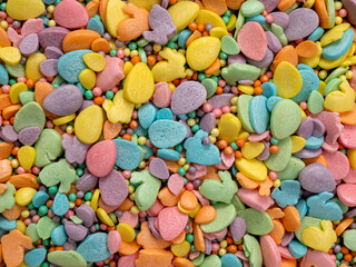 Fototapeta na wymiar colorful sugar decorations for Easter baking. background