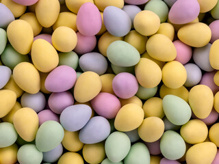 Decor in the form of colorful eggs. chocolate eggs for decoration. background