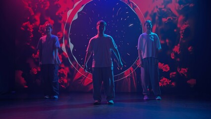 Dynamic Hip-Hop Dance Trio in Neon-Lit Studio