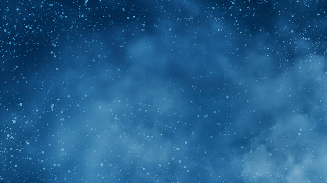 Soft blue snowy speckles on night sky background creating a starry effect