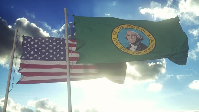 The Washington state flags waving along with the national flag of the United States of America. In the background there is a clear sky