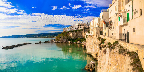 Italy travel. Beautiful coastal town Vieste in Puglia. Italian summer holidays. - 762639870