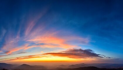 ultra wide panorama of the sunset sky light separated colored clouds there are no birds in the sky