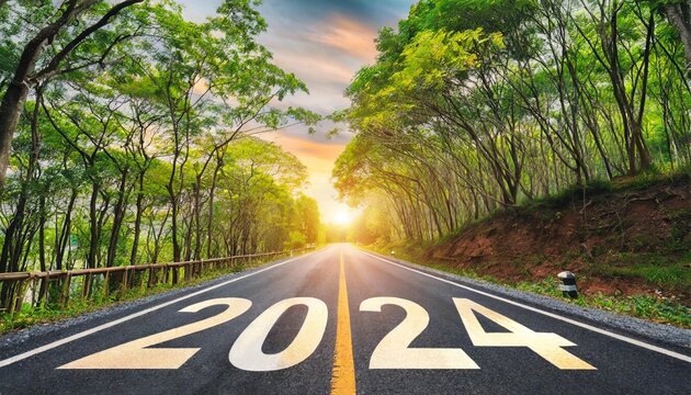happy new year 2024 2024 symbolizes the start of the new year the letter start new year 2024 on the road in the nature route roadway sunset tree environment ecology or greenery wallpaper concept