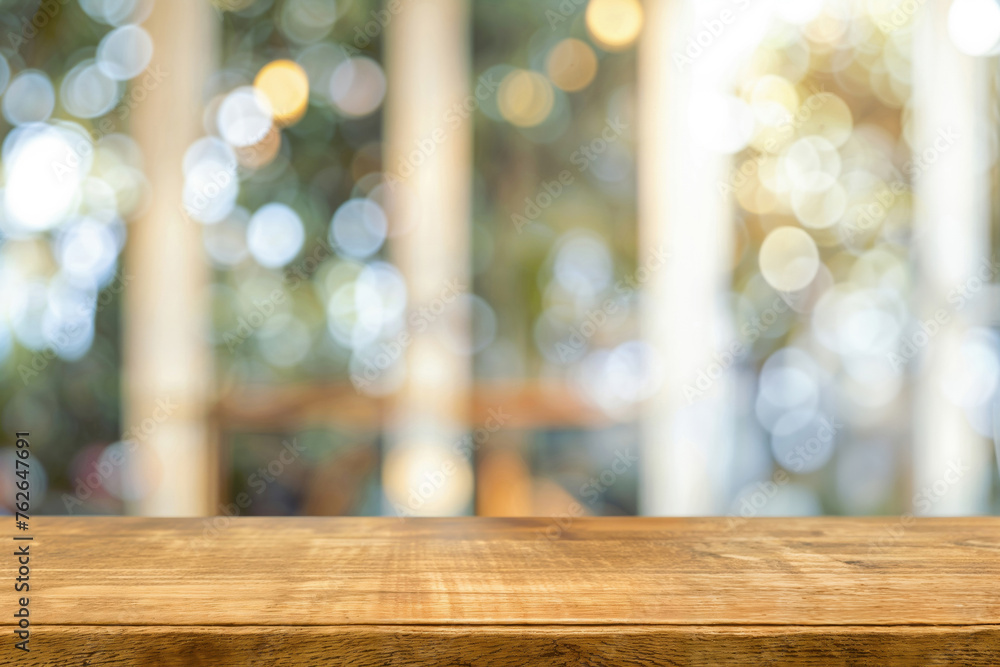 Poster Empty wooden table with blurred bokeh lights in the background. Background concept with copy space for product display montage. High quality photo