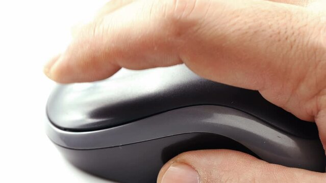 close up hand working with wireless computer mouse device clicking 