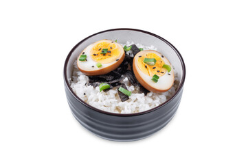 Tamago soy sauce eggs with rice and nori on a white isolated background