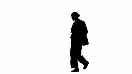 Business woman in formal outfit walking and dancing. Black silhouette on a white isolated background.