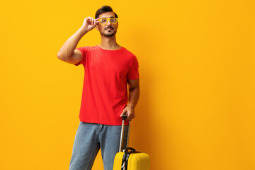 Man journey baggage flight travel suitcase background vacation yellow happy trip traveler studio