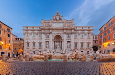 The famous Trevi Fountain in Rome at dawn.