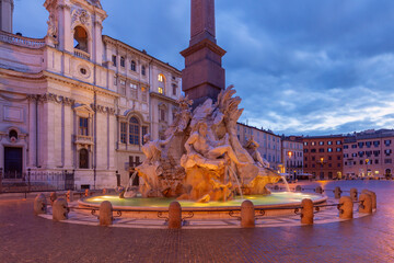 The famous fountains with tritons in Piazza Navona in Rome at dawn. - 762672037