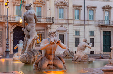 The famous fountains with tritons in Piazza Navona in Rome at dawn. - 762672247