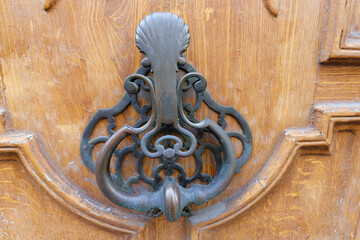 European Vintage old metal wrought iron door knocker. Design detail. Paris. - 762675843