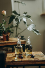 Delicate bottles of massage oil adorn the massage room, adding a touch of elegance to the decor...