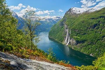 Seven Sisters waterfall in the beautiful Geiranger Fjord, a well known travel destination for...