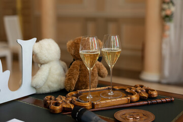 Elegant champagne flutes arranged on mirrored tray