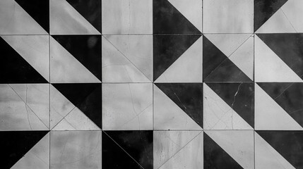 High contrast geometric pattern of black and white floor tiles