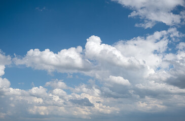 blue sky with white clouds, sky scenery, sunlit clouds