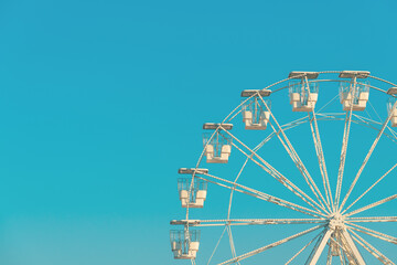 Giant white observation ferris wheel for panoramic view in amusement park is popular entertaining...