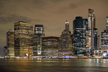 View of night Manhattan with bright lights. New York City, United States