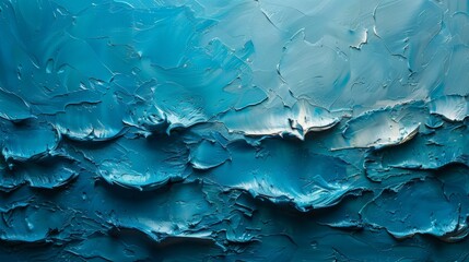  A blue painting with a wave of paint on the bottom, visible in the close-up