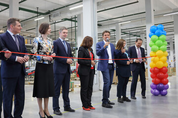 Important persons at opening of new warehouse complex