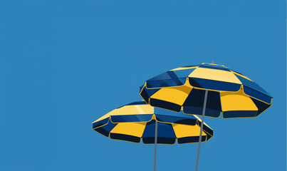 Beach striped umbrella close-up on the background of the blue sky